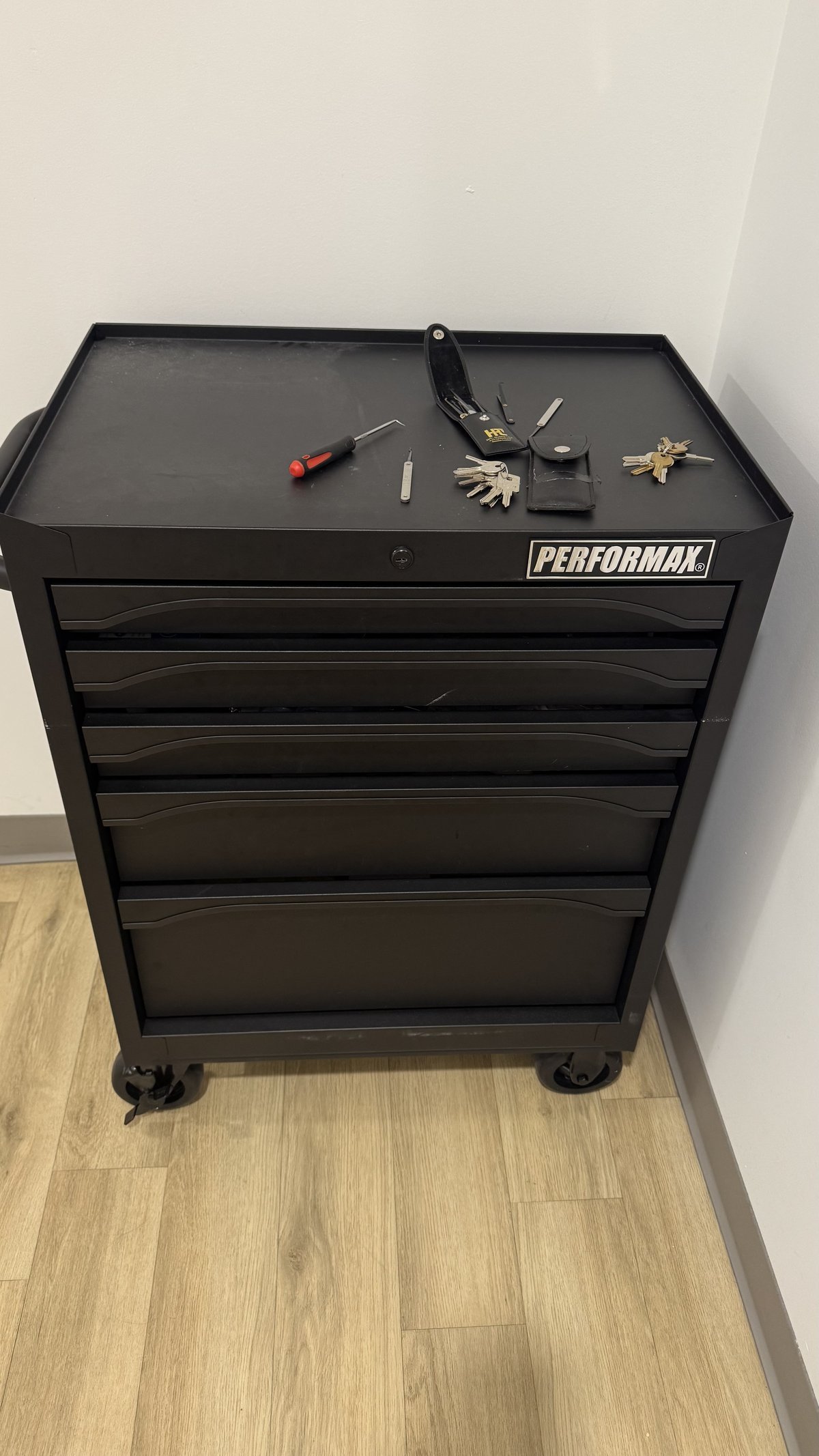 Locksmith Powell Ohio pick tools used to open a locked commercial file cabinet at a dentist office in Lewis Center, Ohio — commercial lockout service