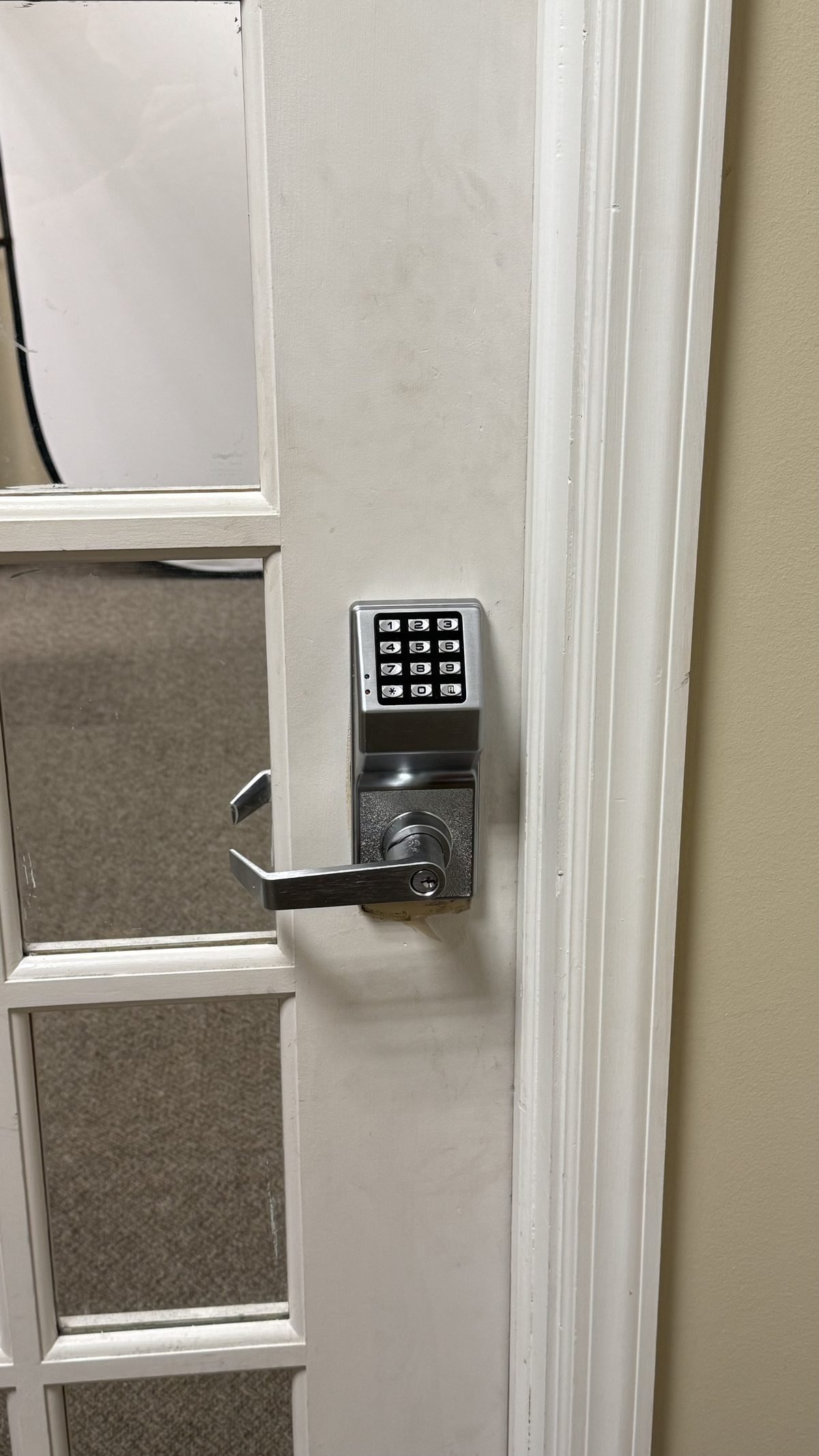 Commercial keypad lock installation on office door by Locksmith Powell Ohio — keypad and combination lock service in Powell Ohio